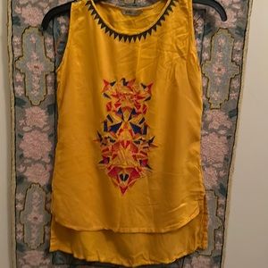 Blouse mustard yellow with beautiful embroidery in pink snd blue